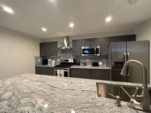 Family House | Private kitchen | Full-size fridge, microwave, oven, stovetop - Checkers Vacation Homes (Providenciales)