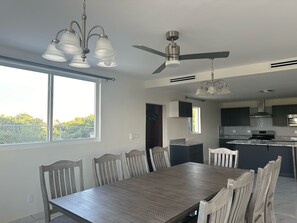 Family House | Private kitchen | Full-size fridge, microwave, oven, stovetop - Checkers Vacation Homes (Providenciales)