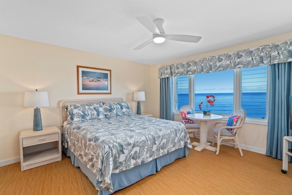 Enjoy magnificent ocean, sunrise & sunset views, from Primary Bedroom's bed.