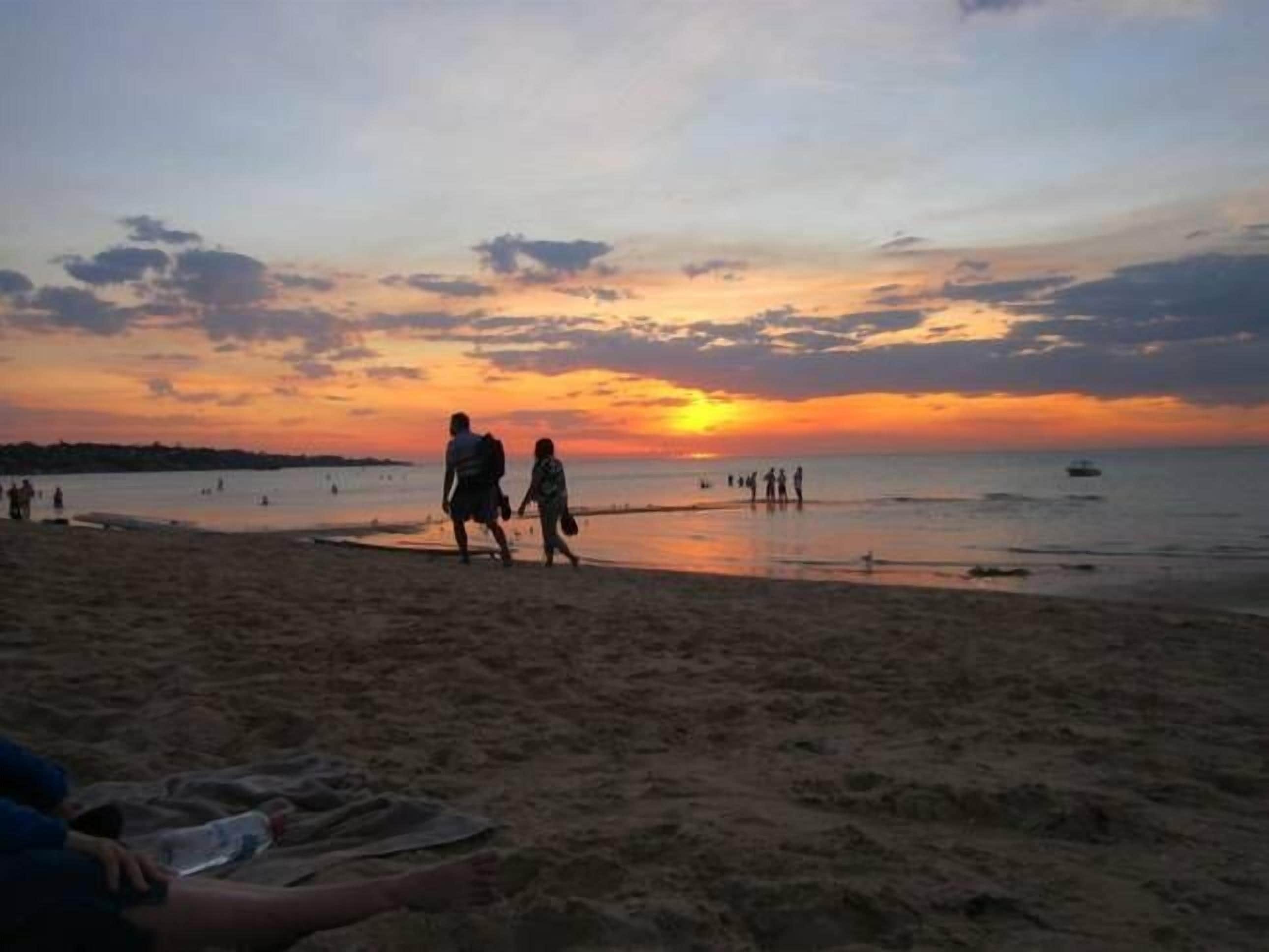 On the beach, sun-loungers