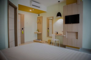 Habitación individual Deluxe, 1 cama King size | Escritorio, cortinas blackout y wifi gratis 