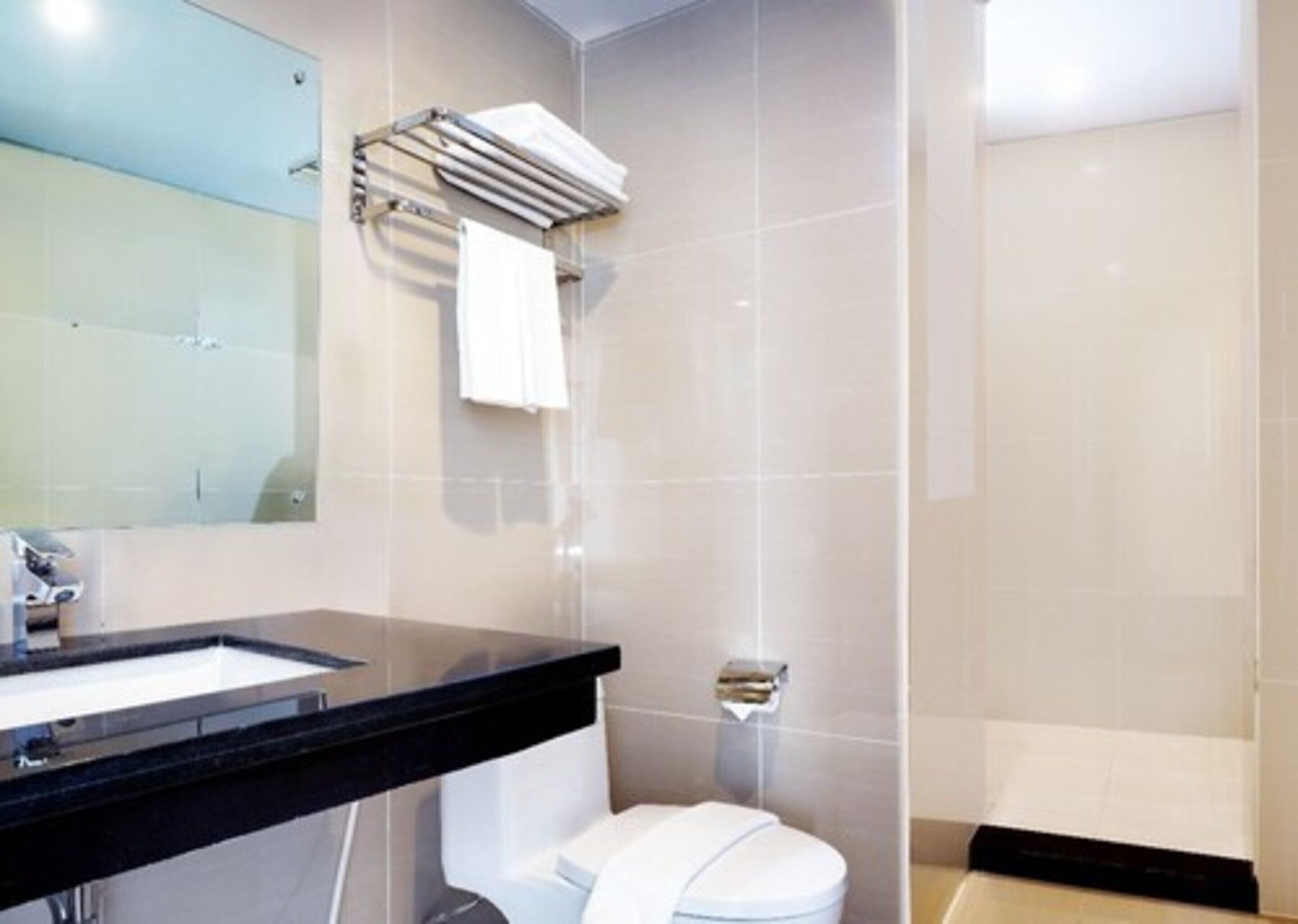 shower, free toiletries, slippers, towels