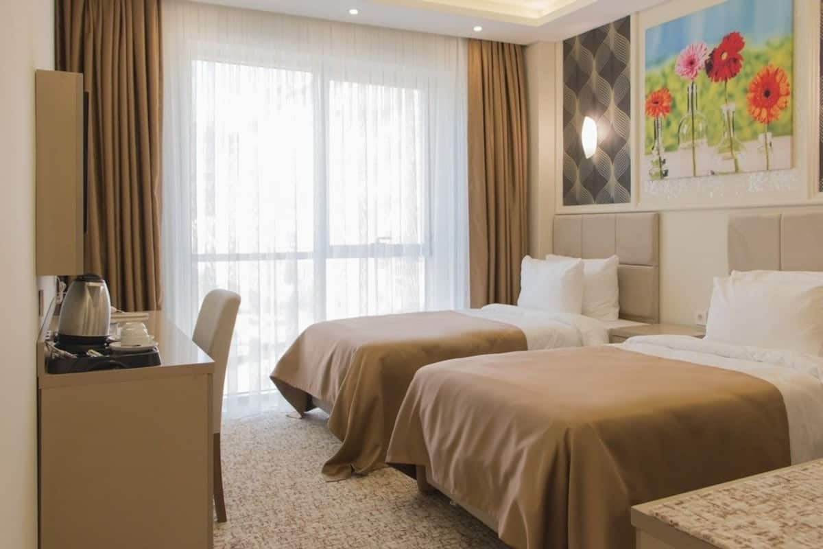 twin room, city view | premium bedding, minibar, in-room safe, desk