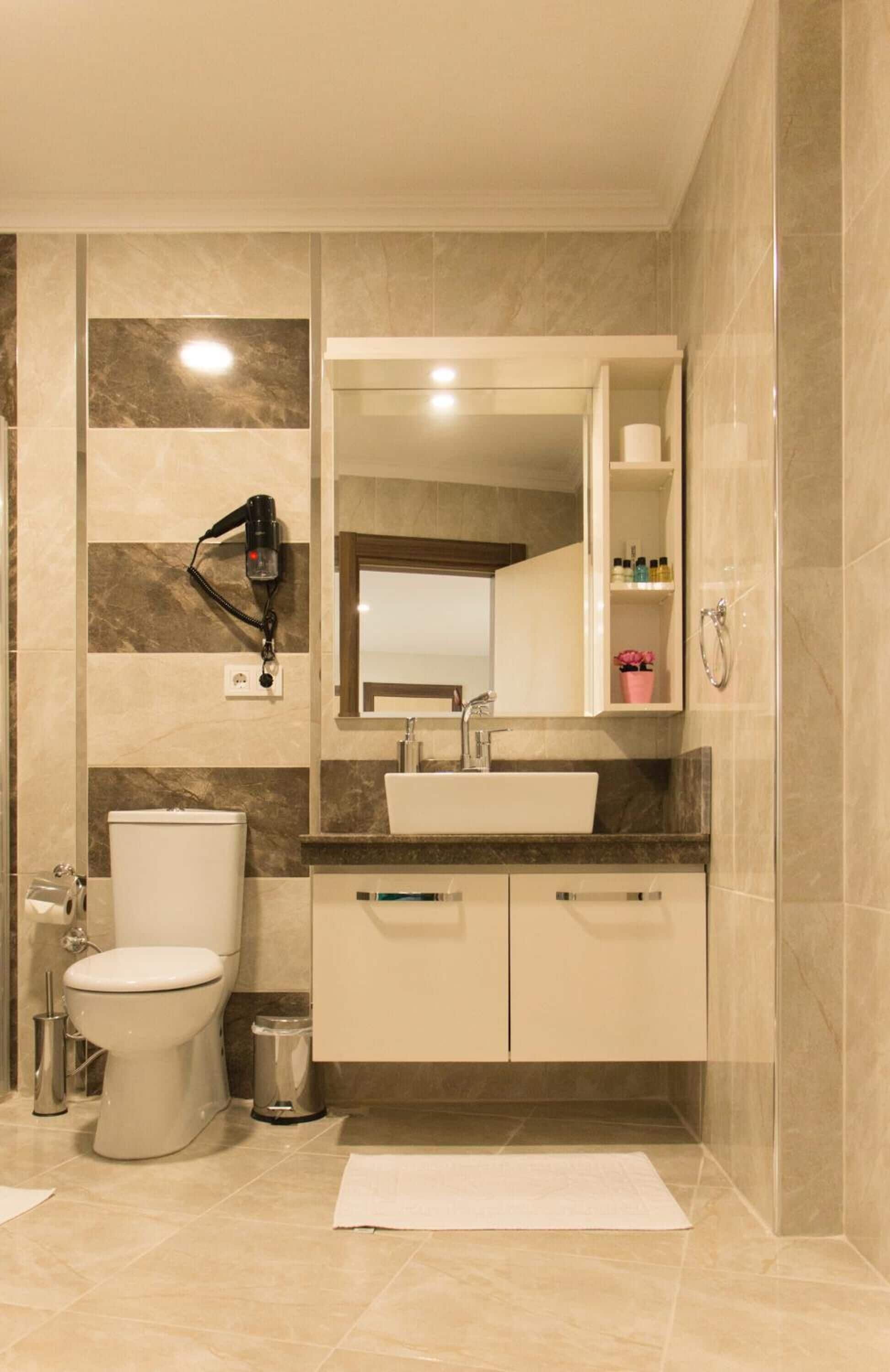 shower, free toiletries, hair dryer, slippers