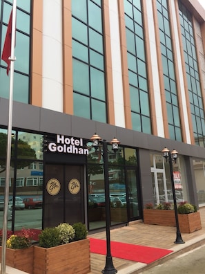 The exterior of Hotel Goldhan with a modern facade, large windows, and a red carpet entrance. - Goldhan Hotel (Tekirdag)