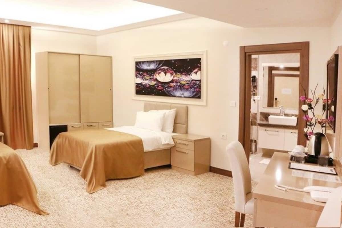 Ropa de cama de alta calidad y minibar