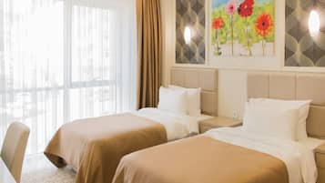 Twin Room, City View | Premium bedding, minibar, in-room safe, desk