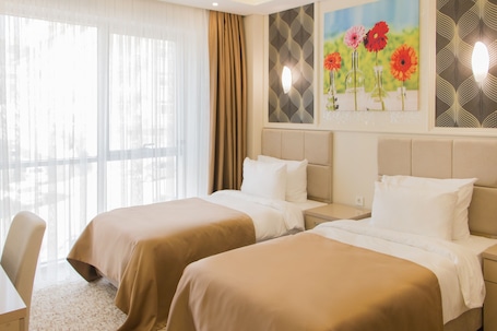 Twin Room, City View | Premium bedding, minibar, in-room safe, desk