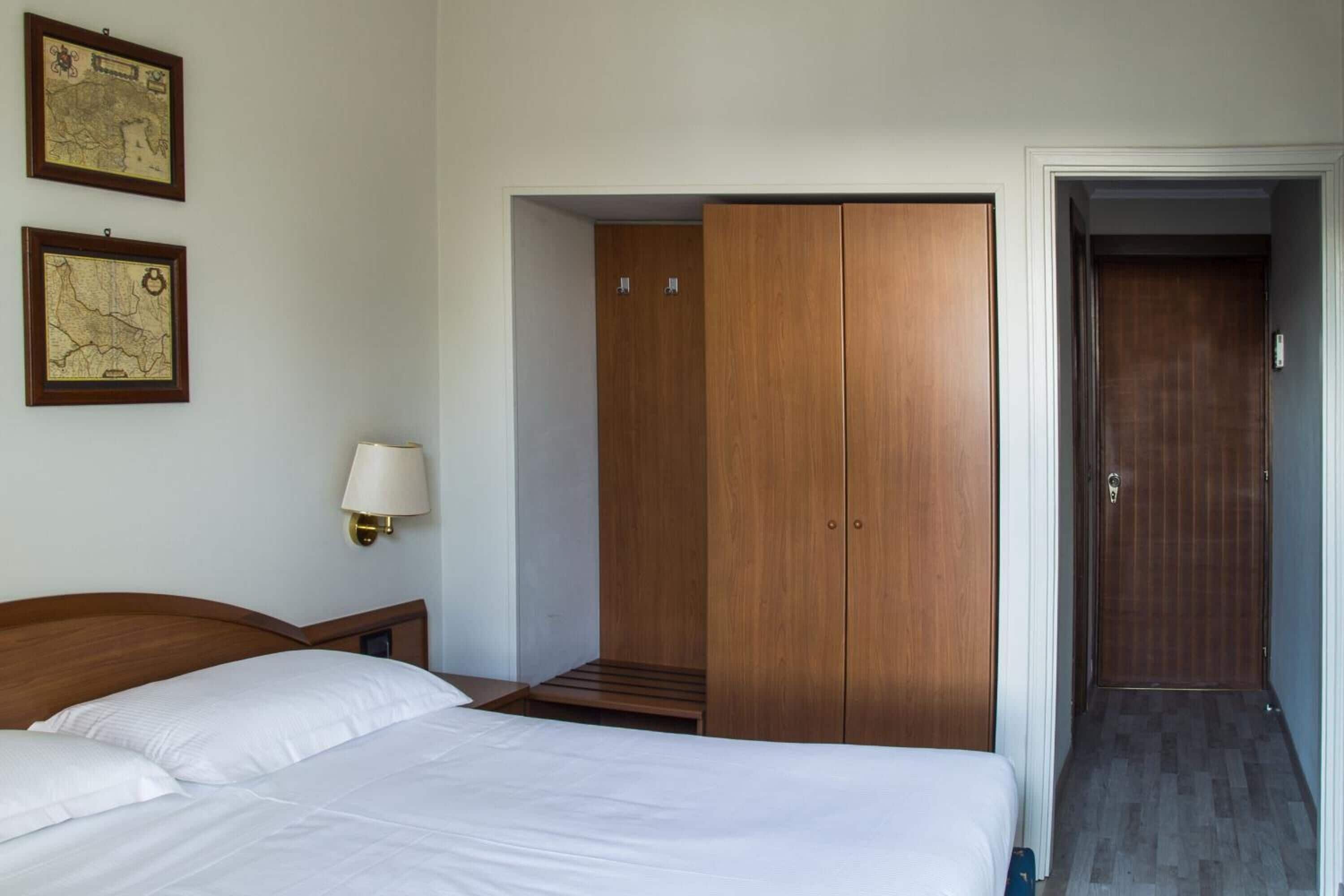 desk, blackout curtains, iron/ironing board, rollaway beds