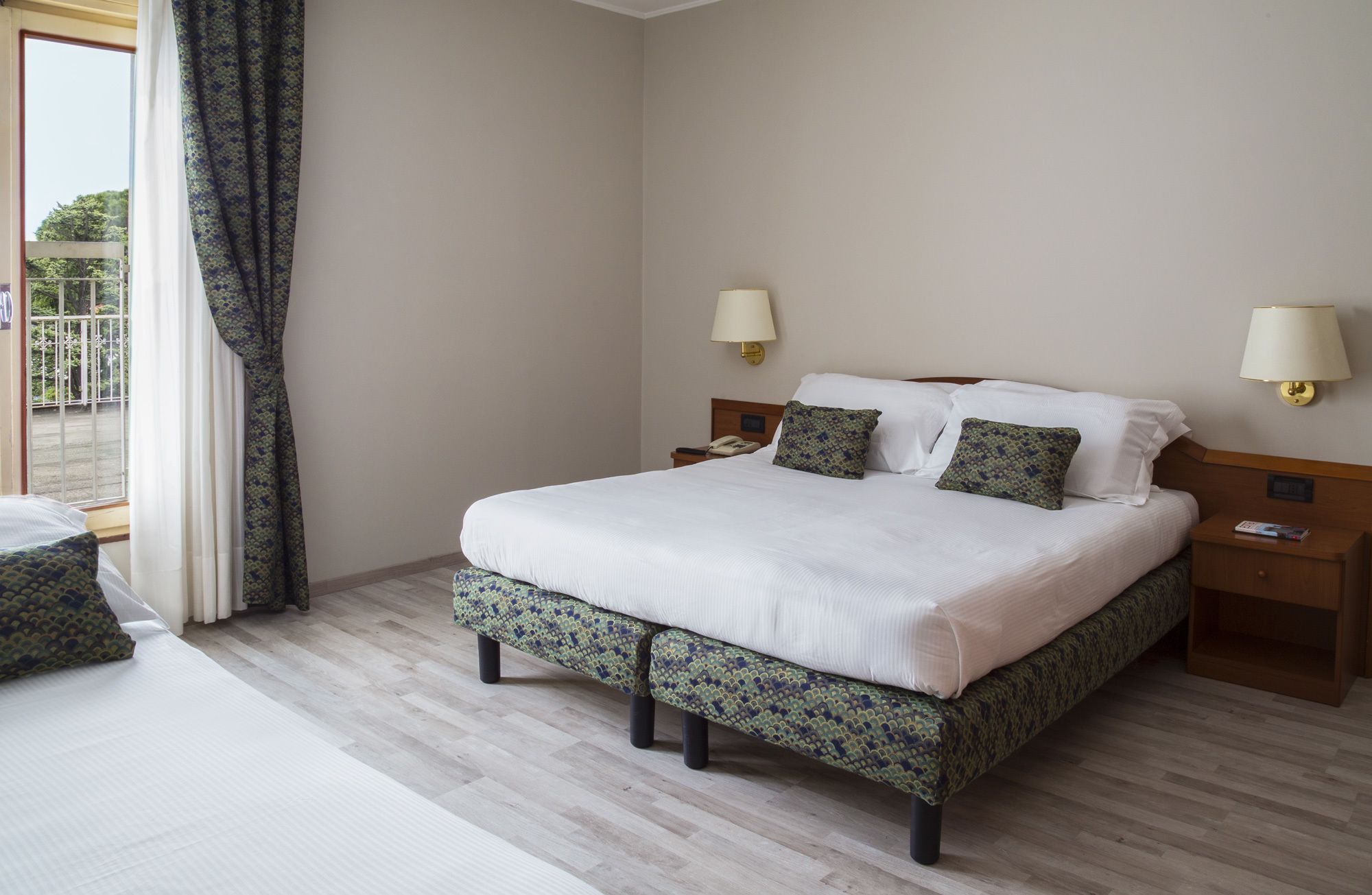 standard triple room | desk, blackout curtains, iron/ironing board, rollaway beds