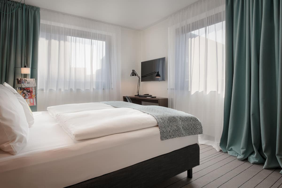 Medium | Premium bedding, down duvets, minibar, in-room safe