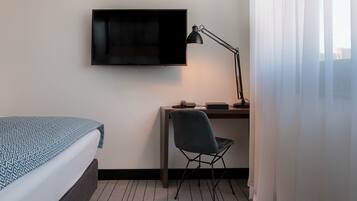 Large | Premium bedding, down comforters, minibar, in-room safe