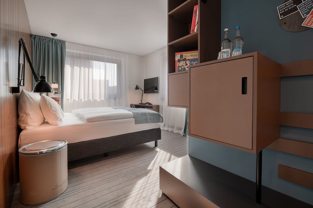 medium | premium bedding, down duvets, minibar, in-room safe