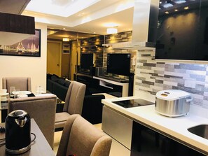 Condo, 2 Bedrooms | Living area | 50-inch flat-screen TV with cable channels, TV, Netflix - Maui 2 Bedroom Condo at Azure Urban Resort Residences (Parañaque)