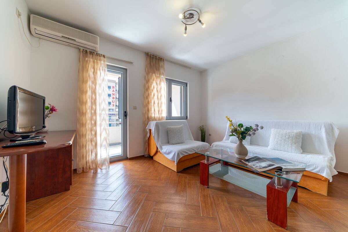 45-inch flat-screen TV with cable channels, TV