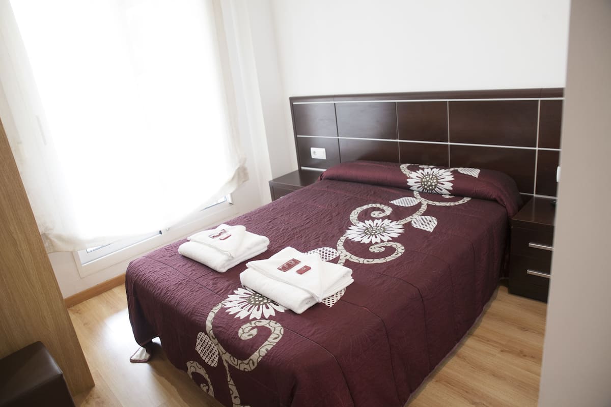 Blackout curtains, soundproofing, free WiFi, bed sheets