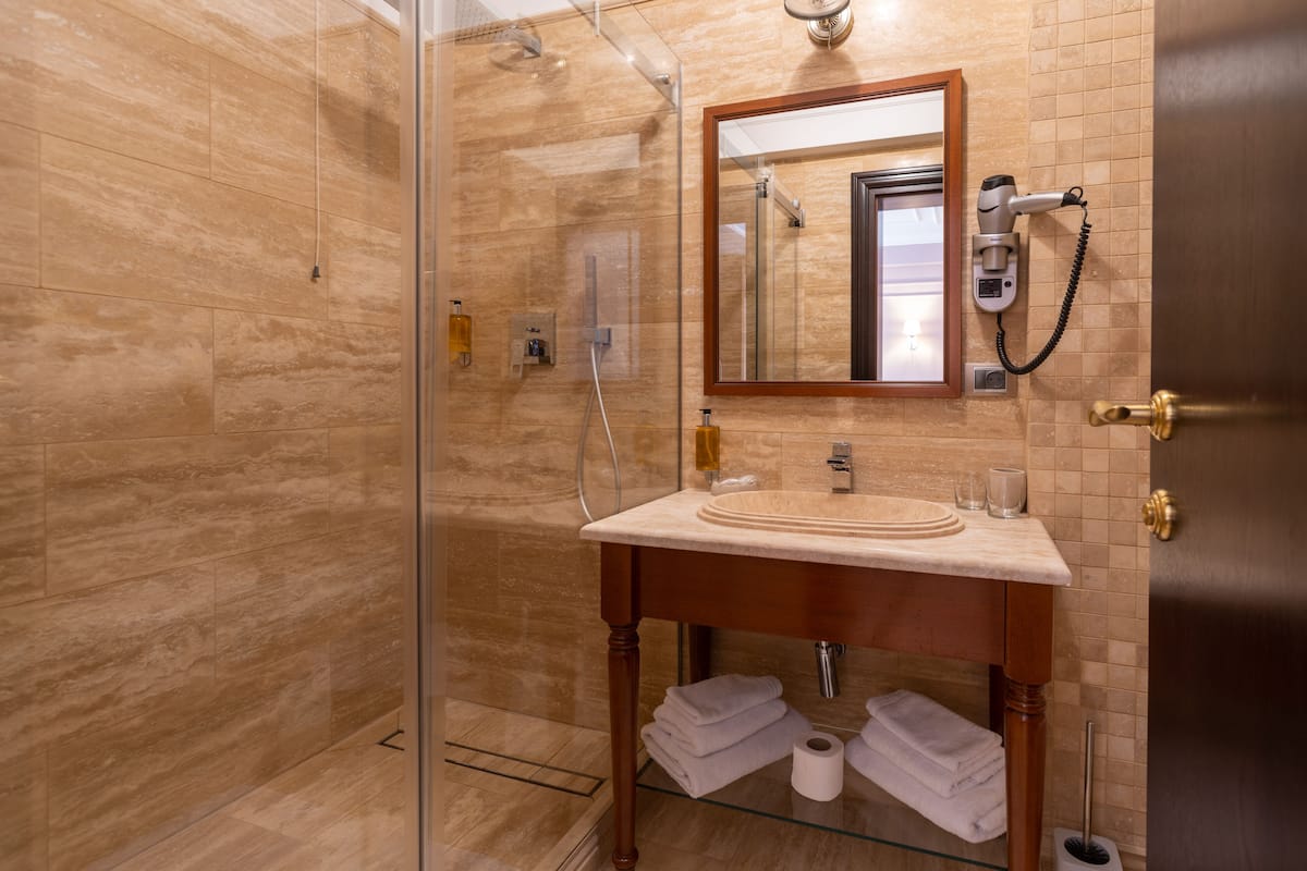 double room | bathroom | shower, free toiletries, hair dryer, bathrobes