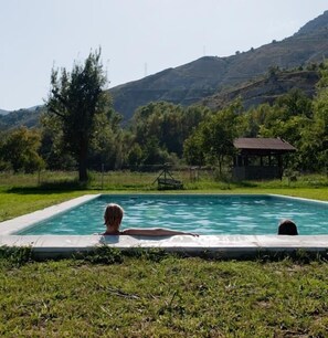 Seasonal outdoor pool, open 10 AM to 8 PM, pool umbrellas, sun loungers