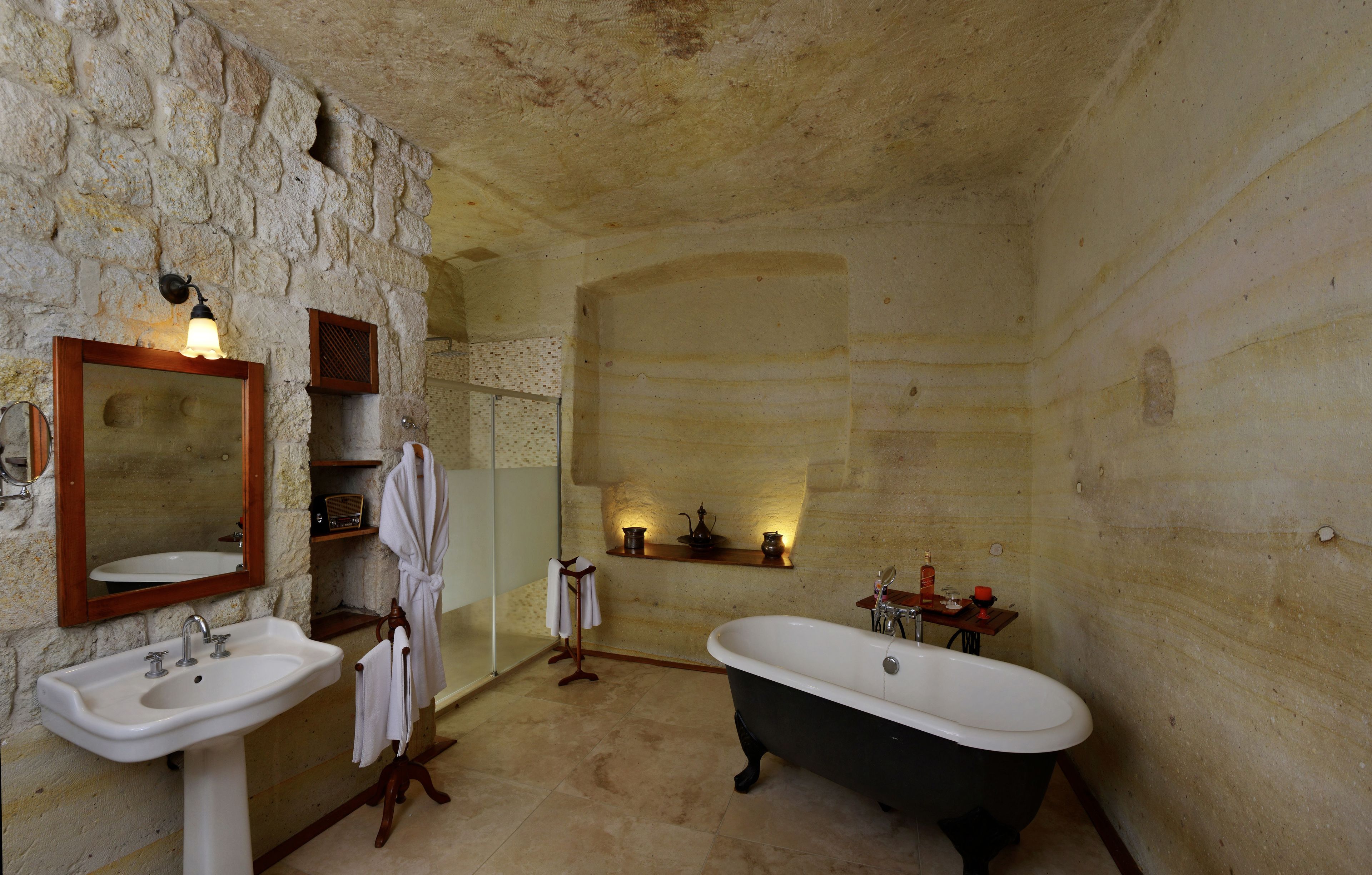 luxury cave house | bathroom | free toiletries, hair dryer, slippers, towels