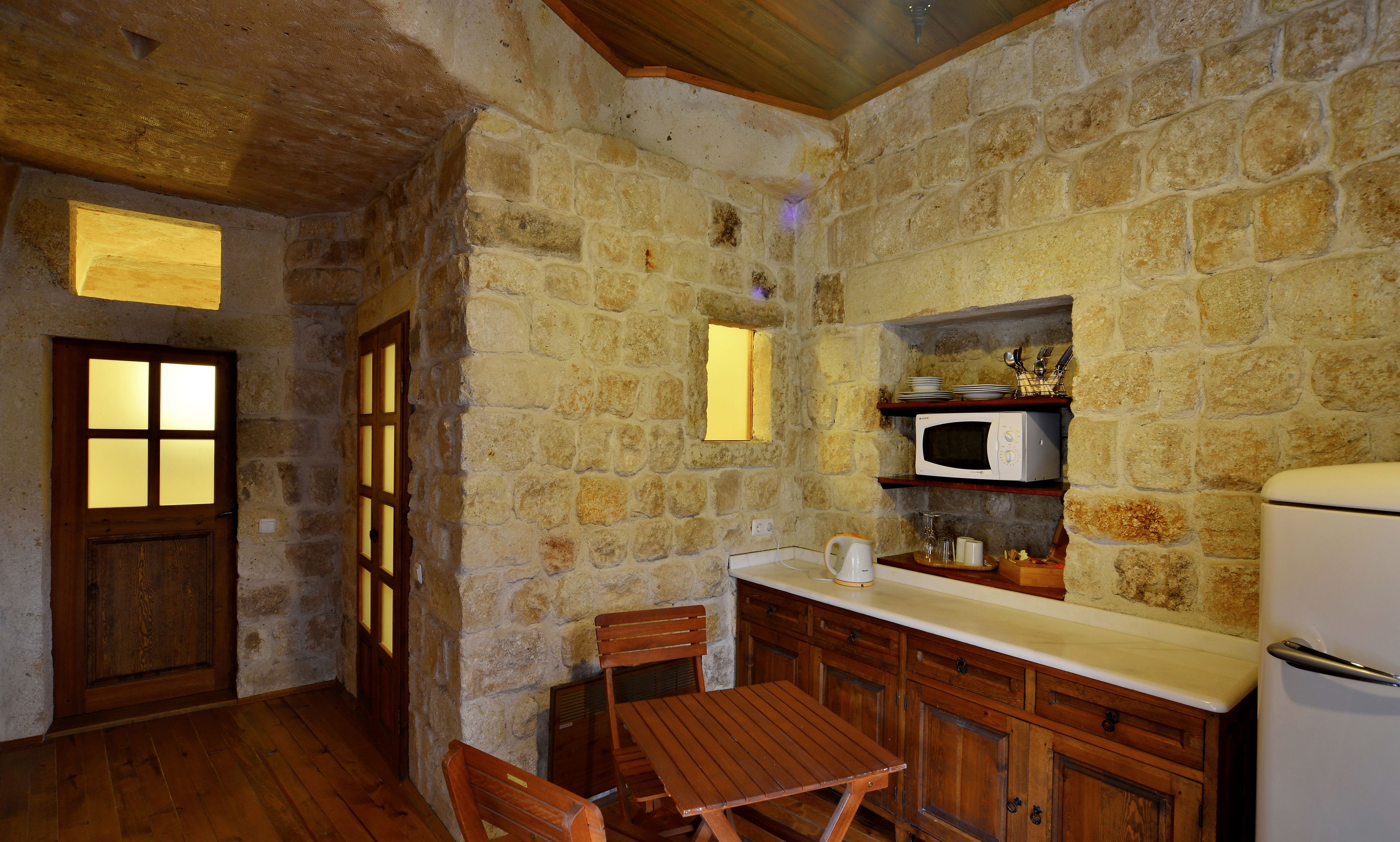 twin arch cave house | private kitchenette | full-sized fridge, microwave, oven, stovetop