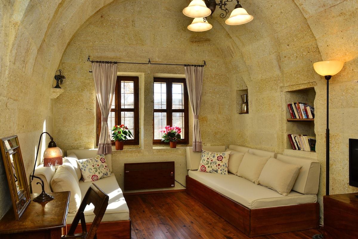 labyrinth cave house | living area | 32-inch lcd tv with cable channels, tv