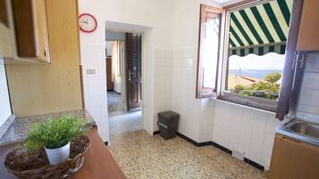 Apartment | Private kitchen | Fridge, oven, cookware/dishes/utensils