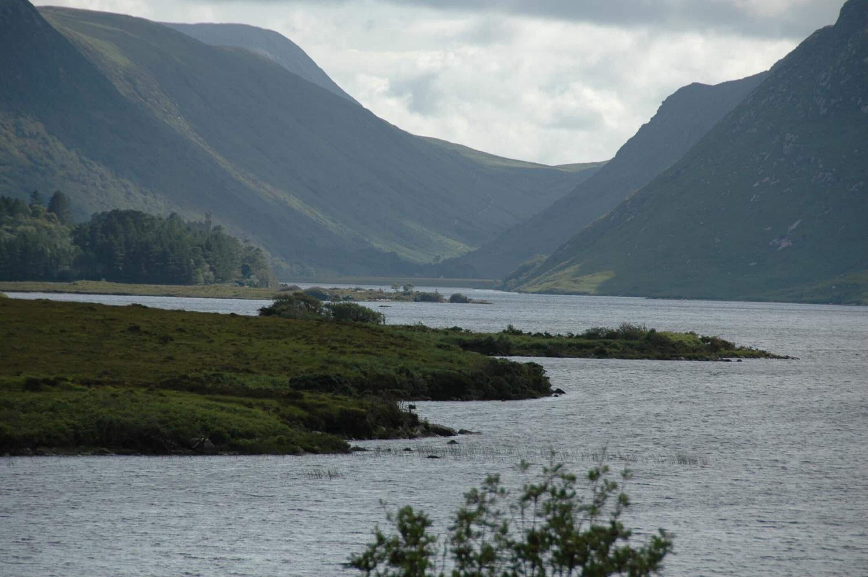 A lake surrounded by mountains.