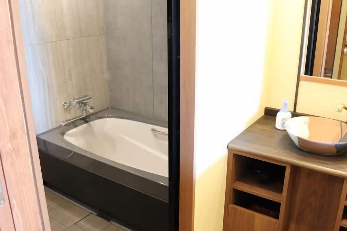 Bathroom | Free toiletries, hair dryer, slippers, bidet