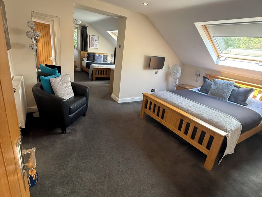 Family Room | Minibar, desk, iron/ironing board, free WiFi