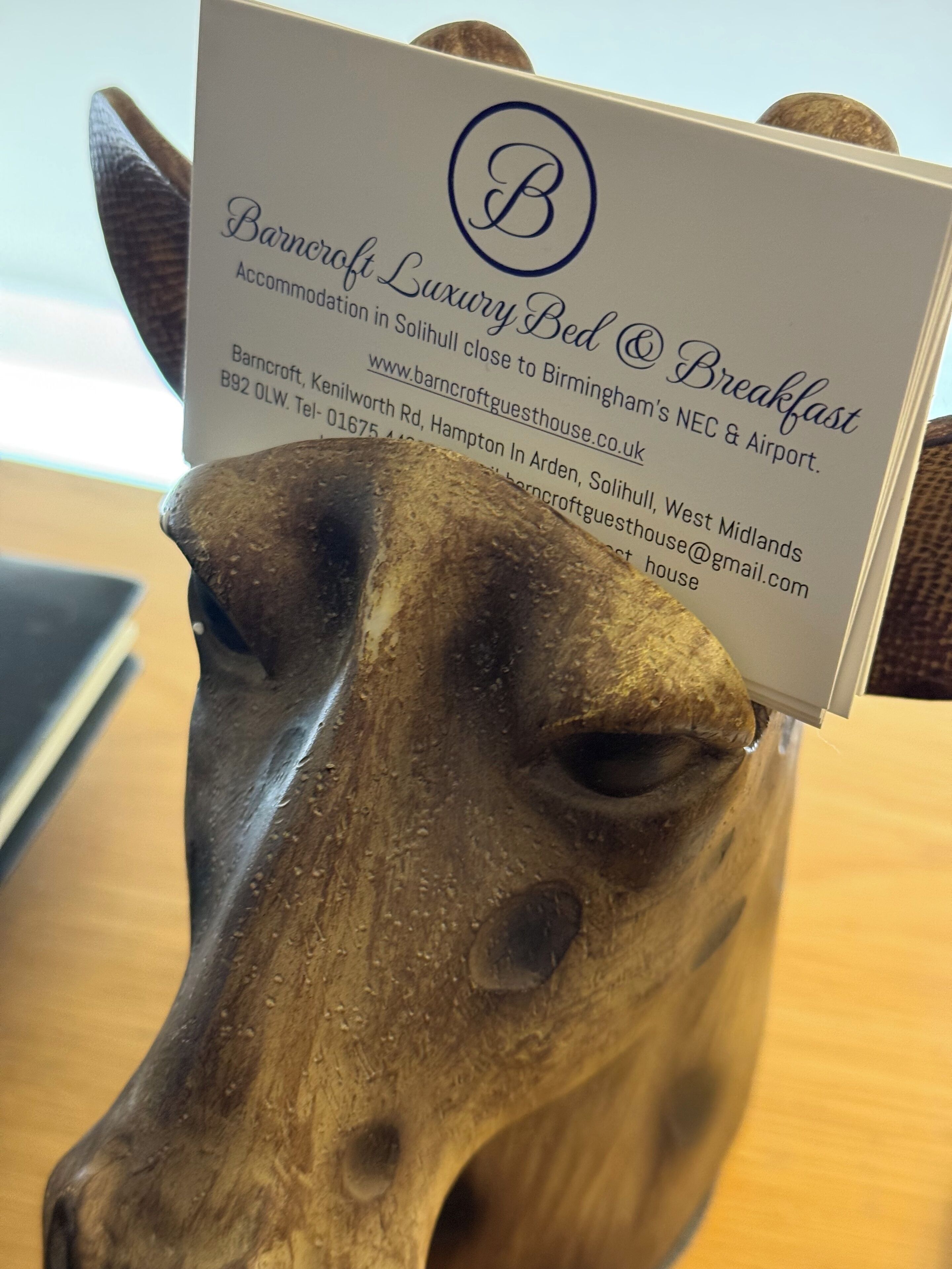 A sign for Barncroft Luxury Bed & Breakfast with contact details and location information.