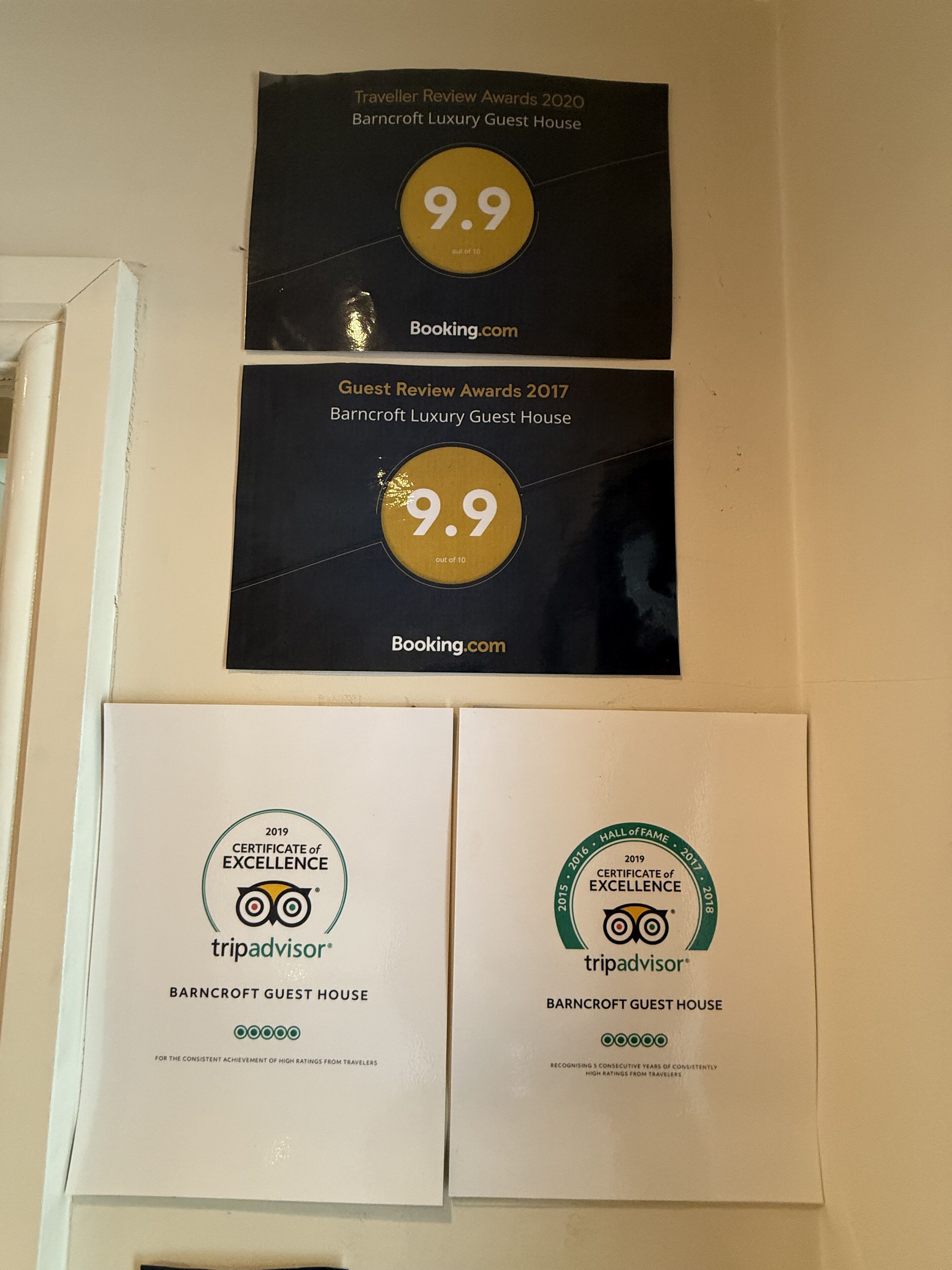 Two awards for Barncroft Luxury Guest House, both rated 9.9 out of 10, and TripAdvisor Excellence Certificates for 2019 and 2016-2018.