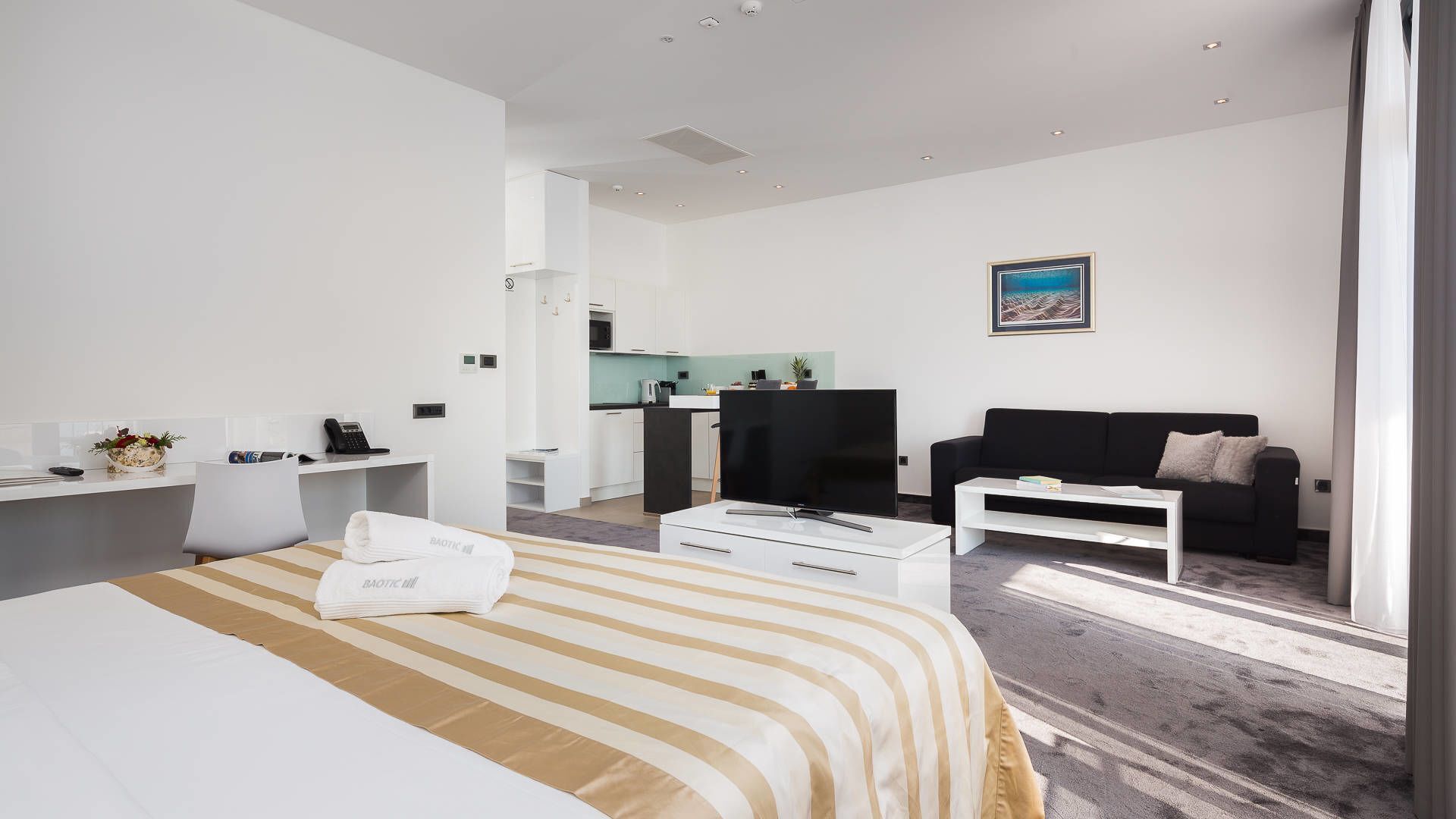 Premium bedding, memory foam beds, in-room safe, desk