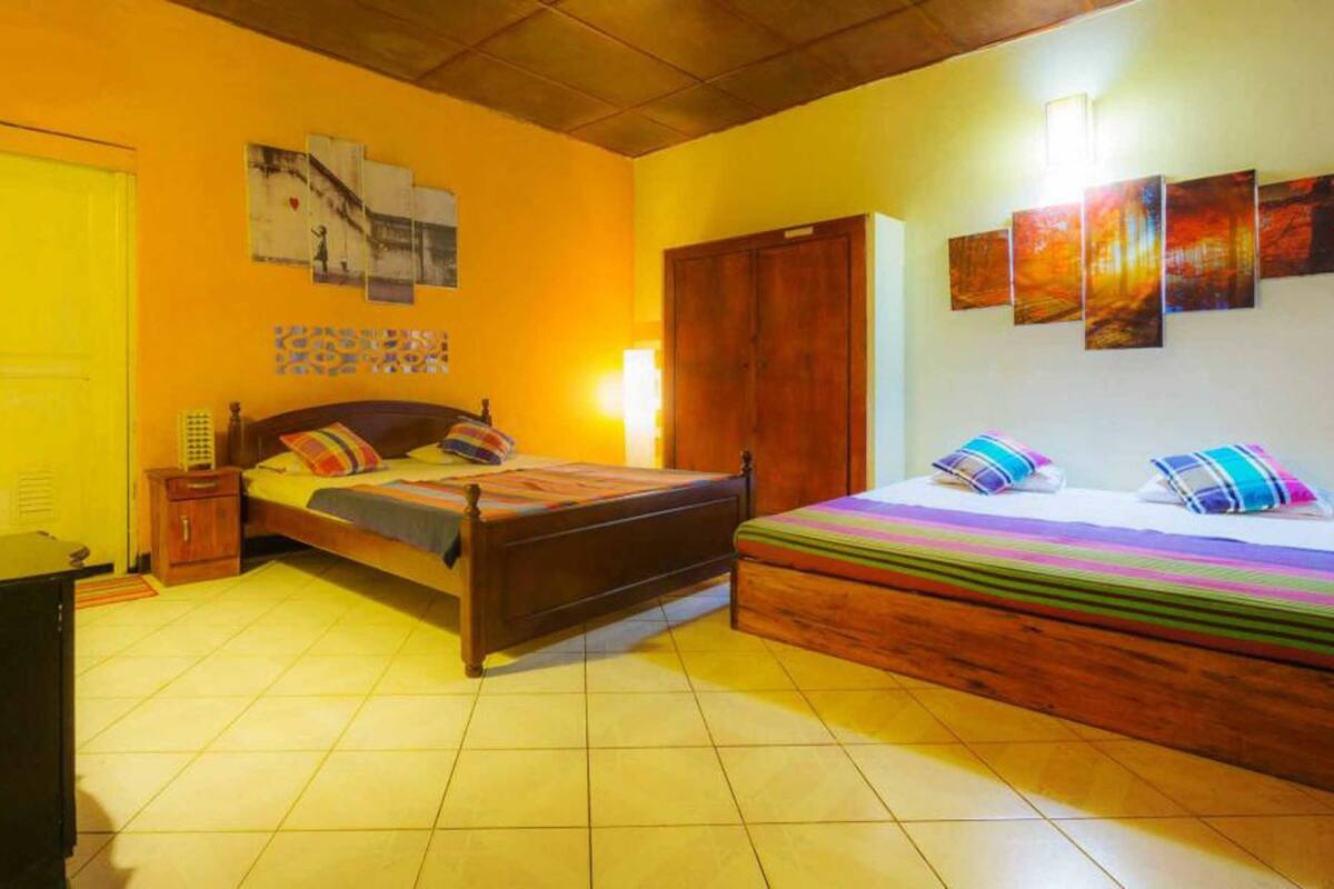 Superior Quadruple Room, 2 Queen Beds, Private Bathroom, Hill View | Desk, iron/ironing board, free WiFi, bed sheets