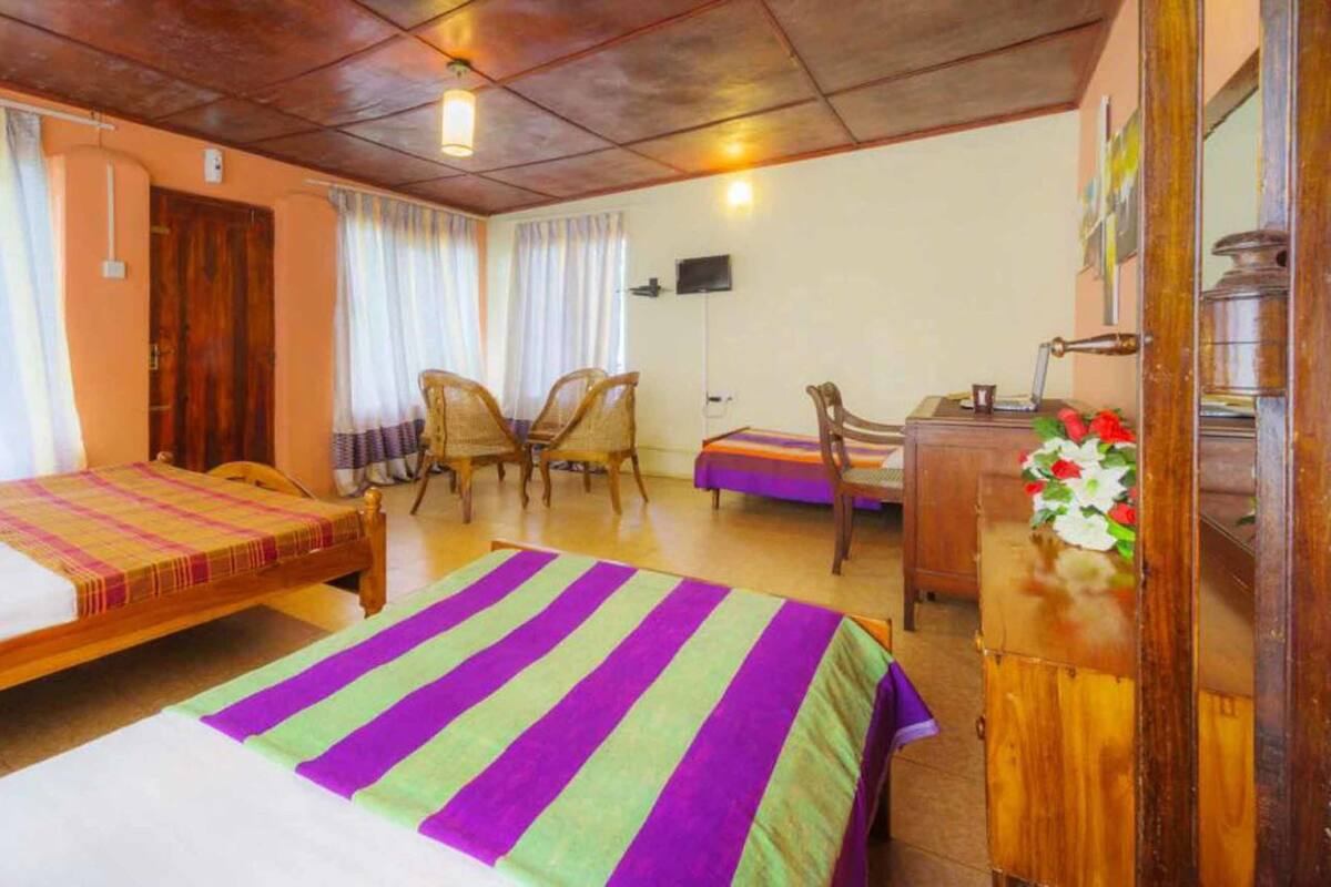 Deluxe Triple Room, Multiple Beds, Private Bathroom, Hill View | Desk, iron/ironing board, free WiFi, bed sheets