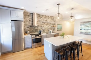 Luxury Apartment, 3 Bedrooms | Private kitchen | Full-size fridge, microwave, stovetop, dishwasher