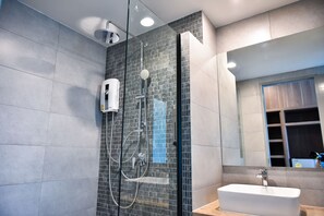 Deluxe Double Room | Bathroom | Shower, free toiletries, towels - At Sleep (Nakhon Pathom)