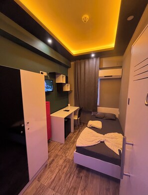 Desk, free WiFi, bed sheets