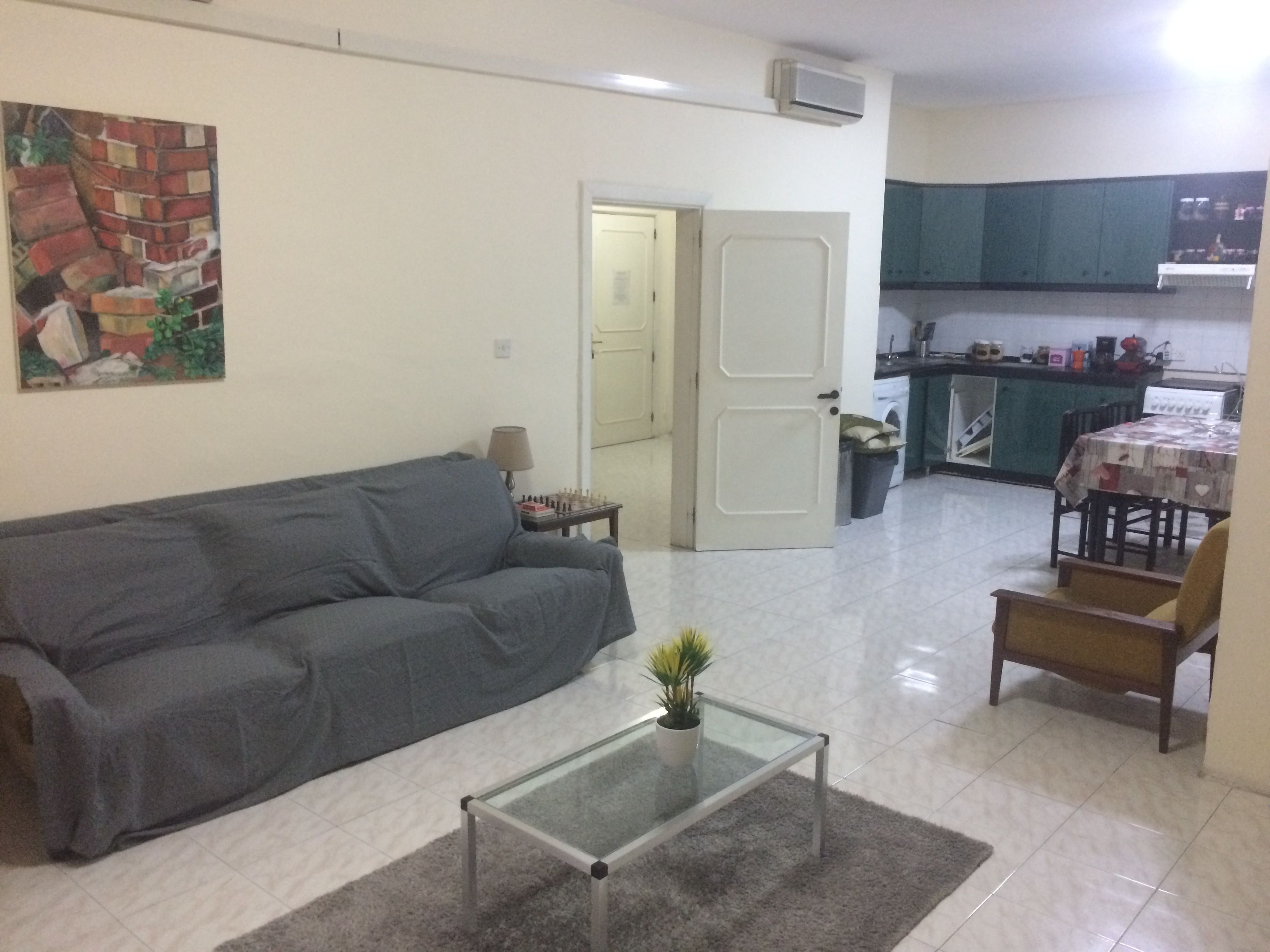 Appartement Panoramique, 2 chambres, vue mer | Coin séjour | Télévision LCD de 24 pouces avec chaînes par câble, télévision