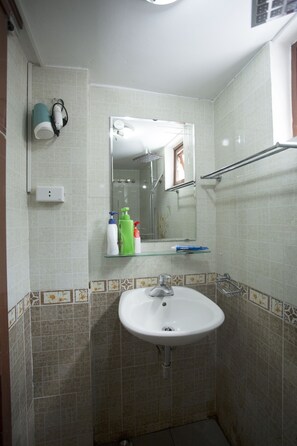 Shower, hydromassage showerhead, designer toiletries, hair dryer