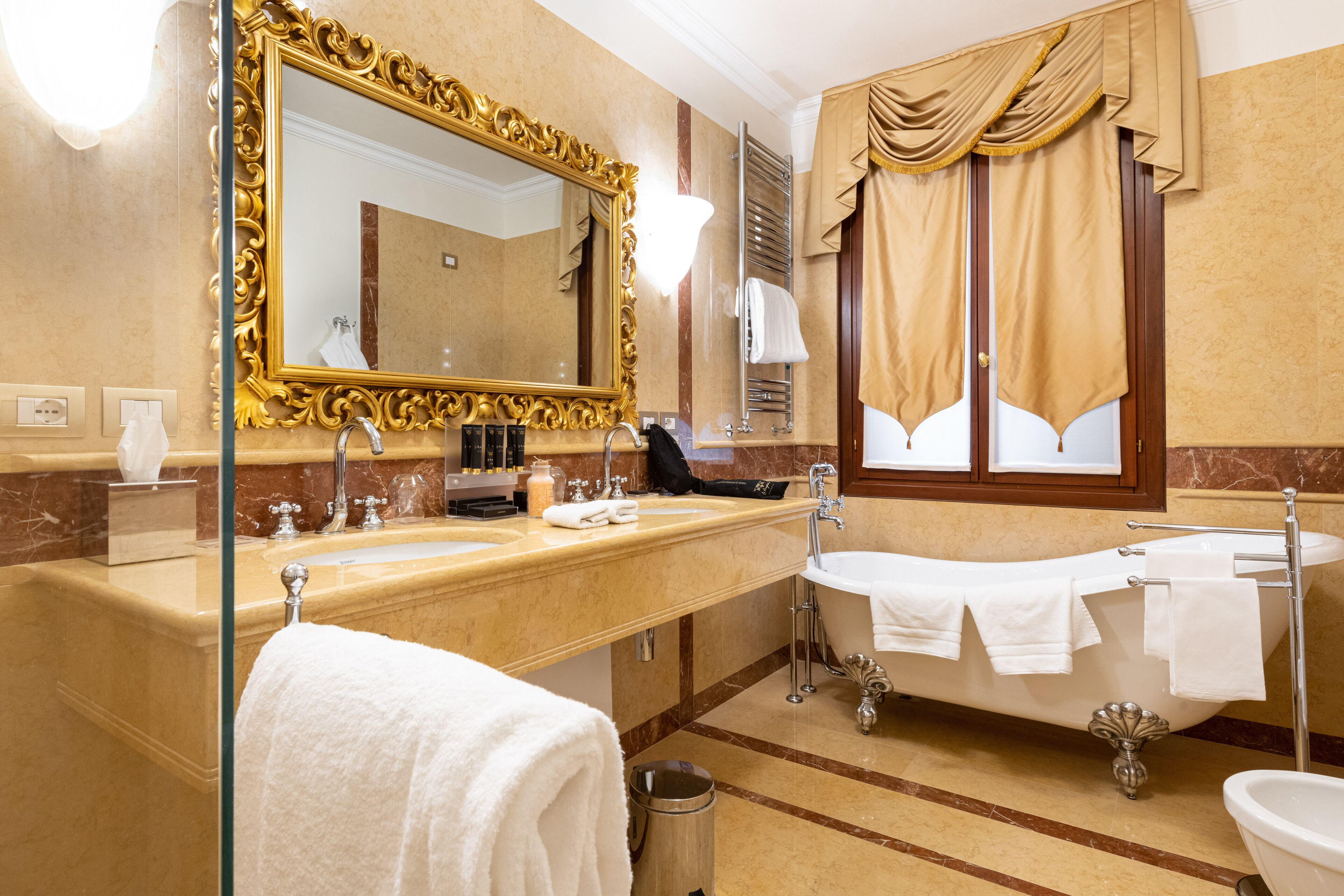 deluxe suite | bathroom | free toiletries, hair dryer, bathrobes, slippers