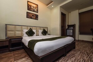 Standard Double Room | Bed sheets - OYO 8265 The Olive Inn (New Delhi)