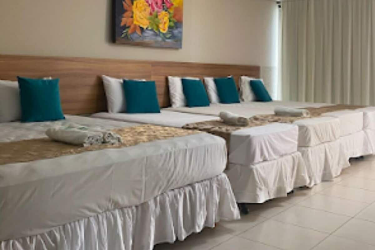 Family Room, Multiple Beds | Minibar, desk, blackout drapes, free WiFi