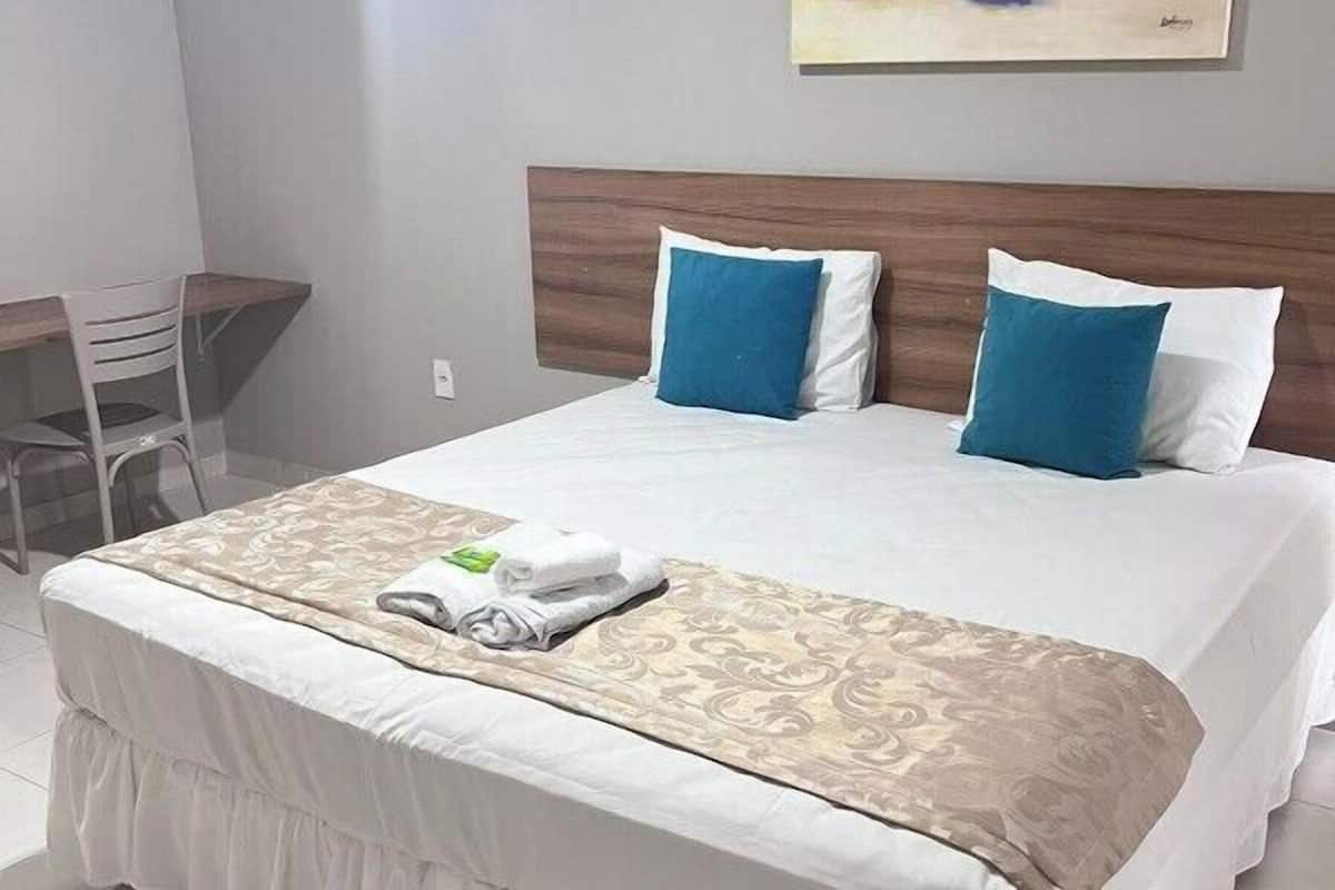 deluxe double or twin room | minibar, desk, blackout curtains, free wifi