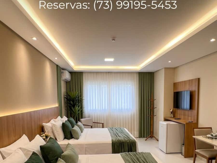 Quarto quádruplo família, várias camas | Frigobar, escrivaninha, cortinas blackout, Wi-Fi de cortesia