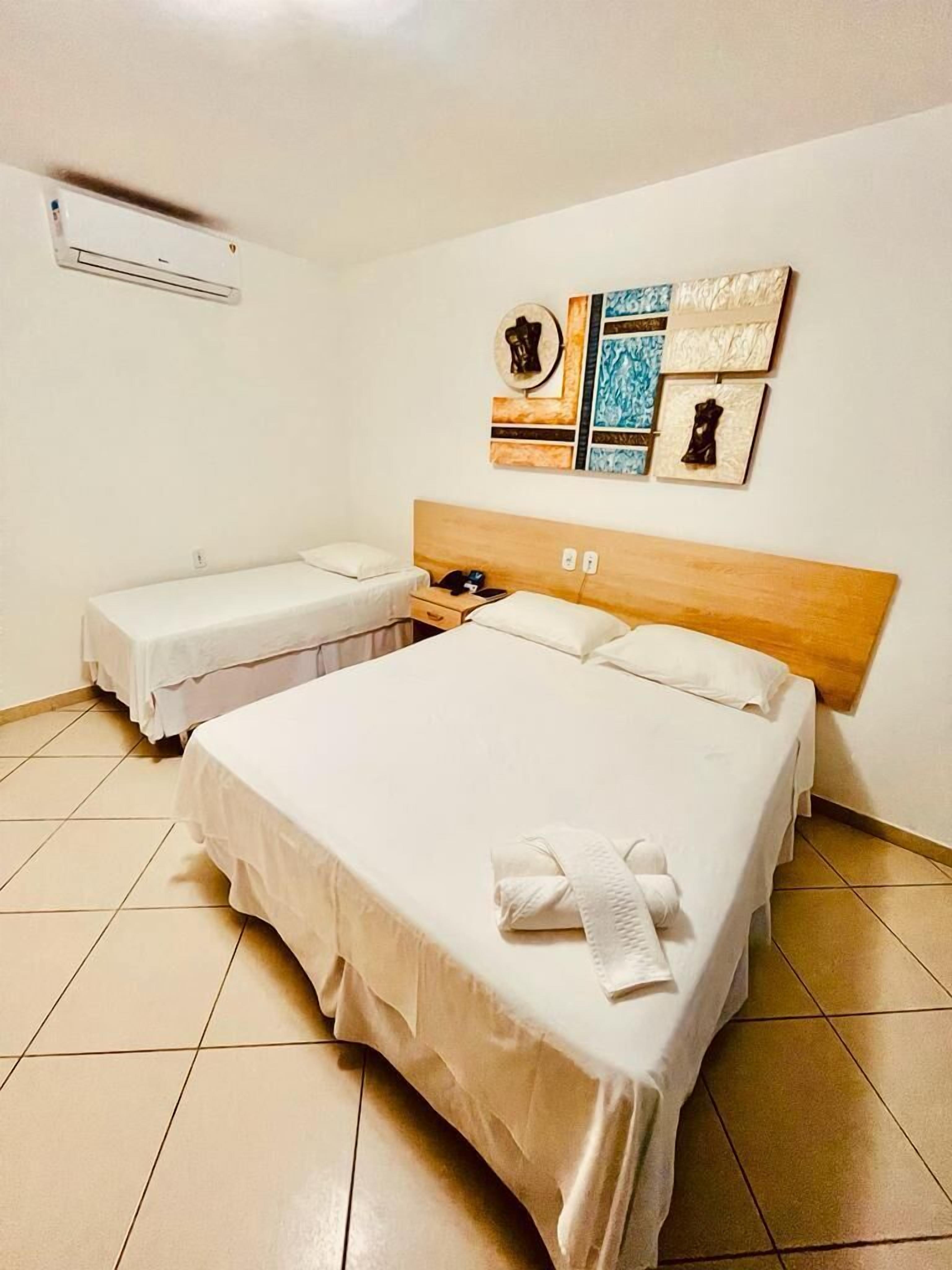 minibar, desk, blackout curtains, iron/ironing board