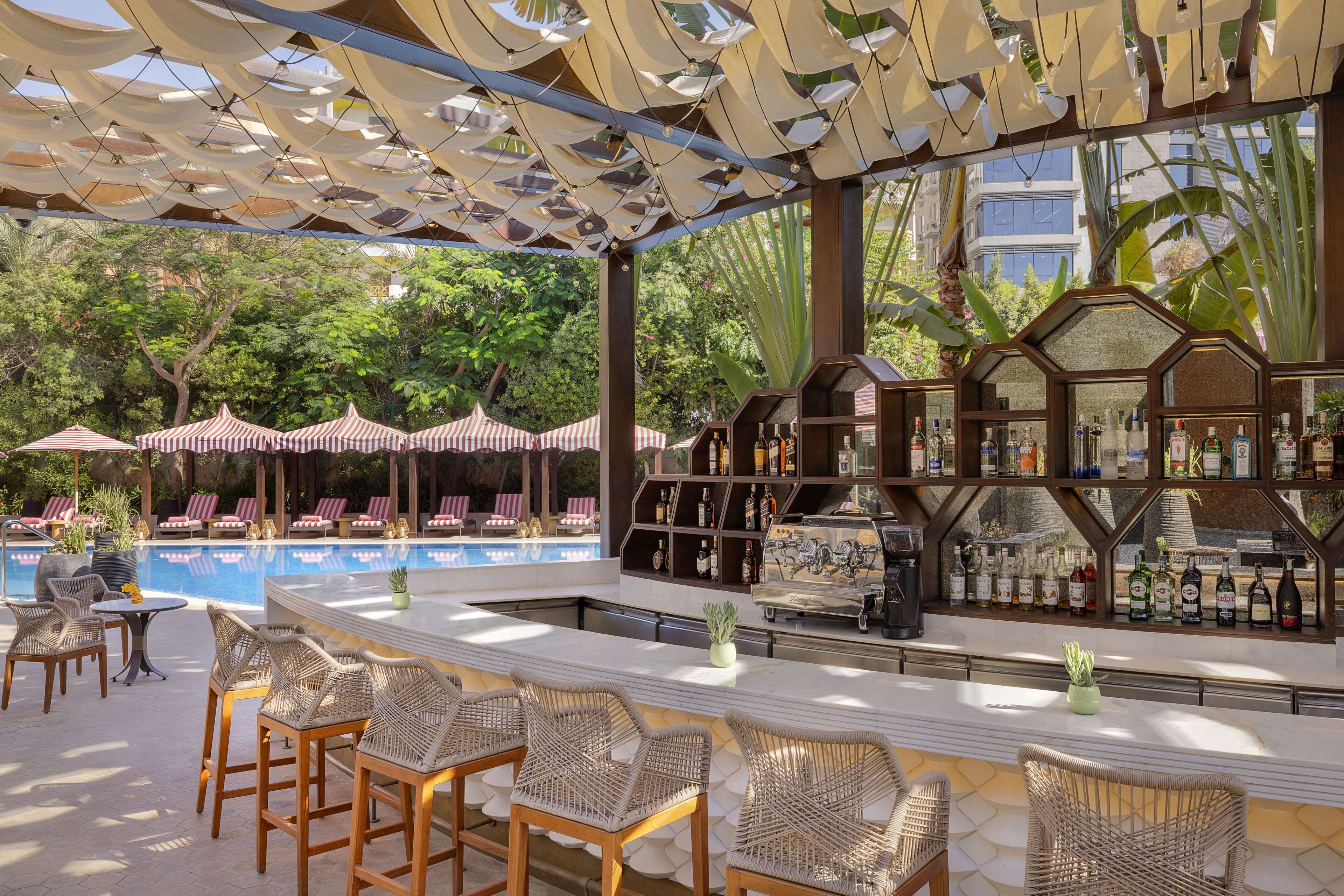 outdoor pool, open 7:00 am to 5:00 pm, free pool cabanas, pool umbrellas