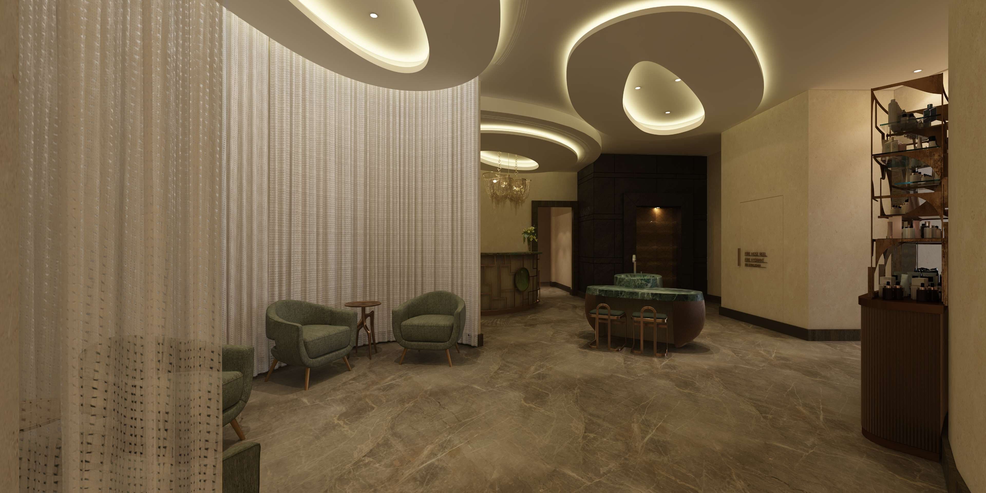 Un interior moderno con suelo de mármol, sillas tapizadas en verde, una pequeña mesa redonda y una pared decorativa con líneas verticales.