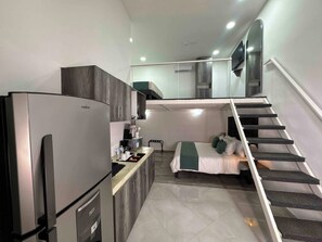 LOFT KING SUITE | Espacio para trabajar con laptop, cunas gratuitas y wifi gratis 