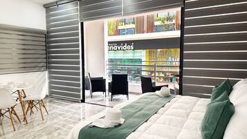 Luxury Suite, 1 King Bed with Sofa bed, Balcony, City View | Laptop workspace, free WiFi, bed sheets