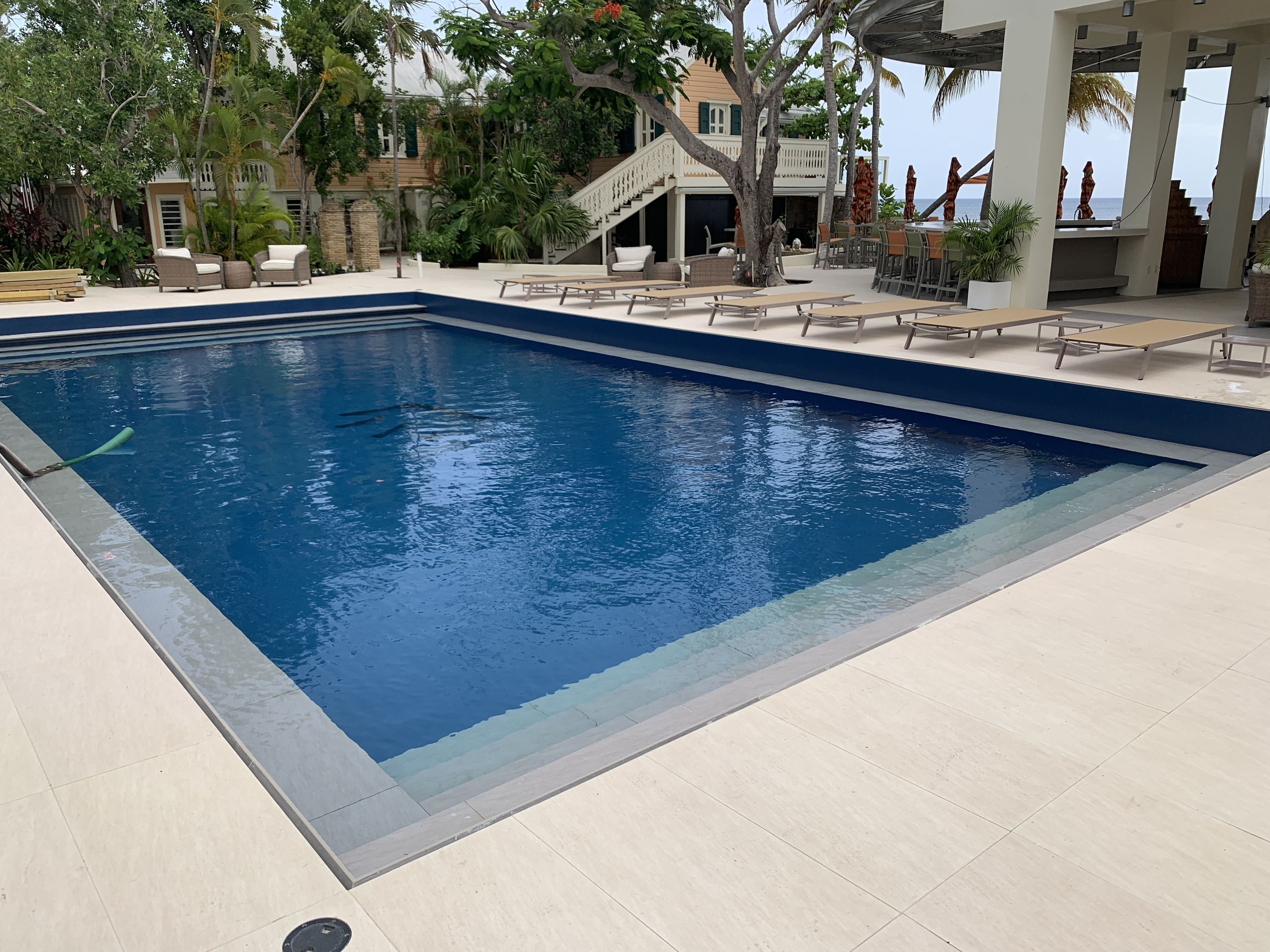 2 outdoor pools, open 7:00 am to 10:00 pm, pool umbrellas, pool loungers